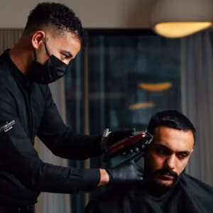 Precision hair styling and skin fade haircut at The Groomsmen salon in Oud Metha, Dubai